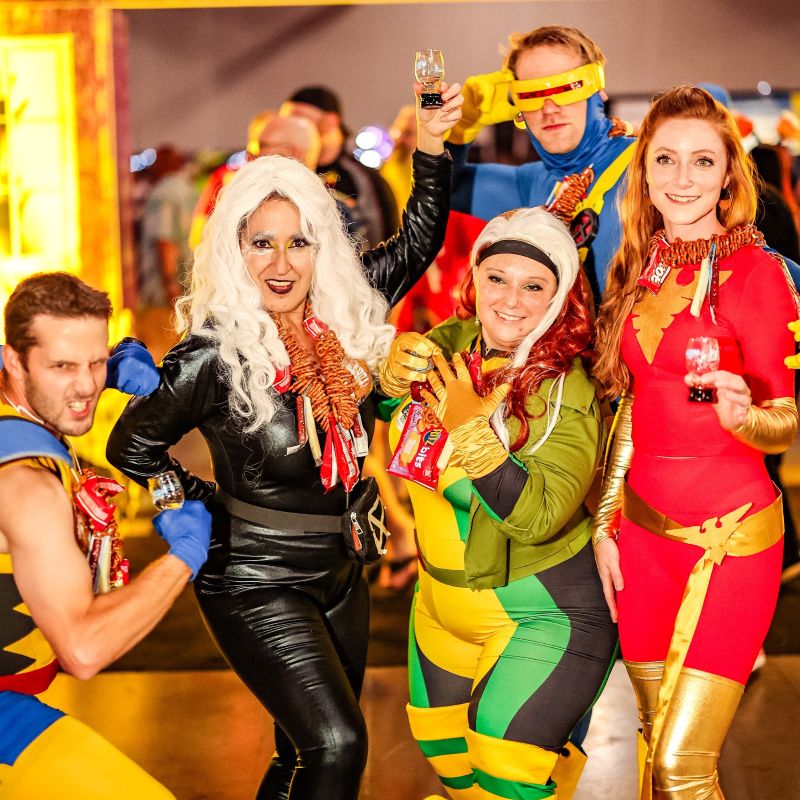 Saturday Afternoon: Iconic Musicians & Bands a group of people dressed like superheroes