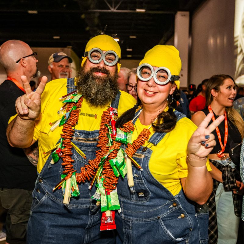 Friday: Festival Flair a man and a woman dressed as minions