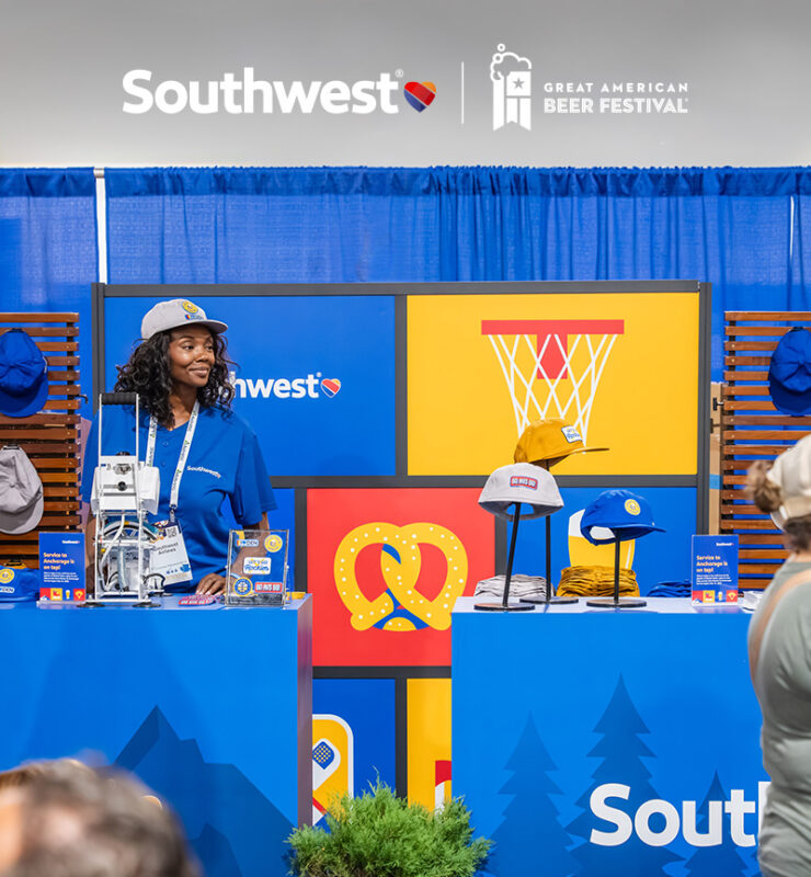 A woman at the Southwest booth at GABF