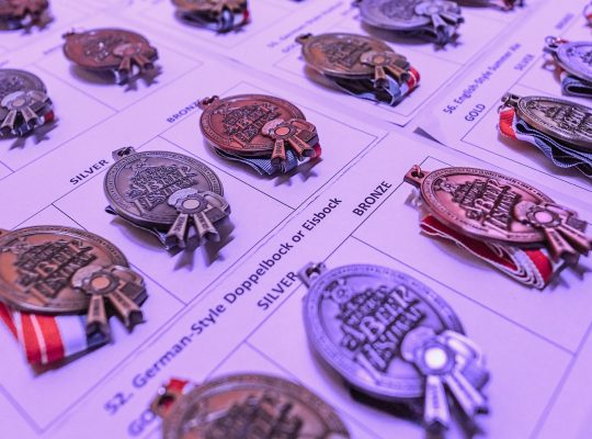 Rows of Great American Beer Festival medals
