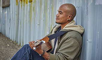 Musician playing a guitar